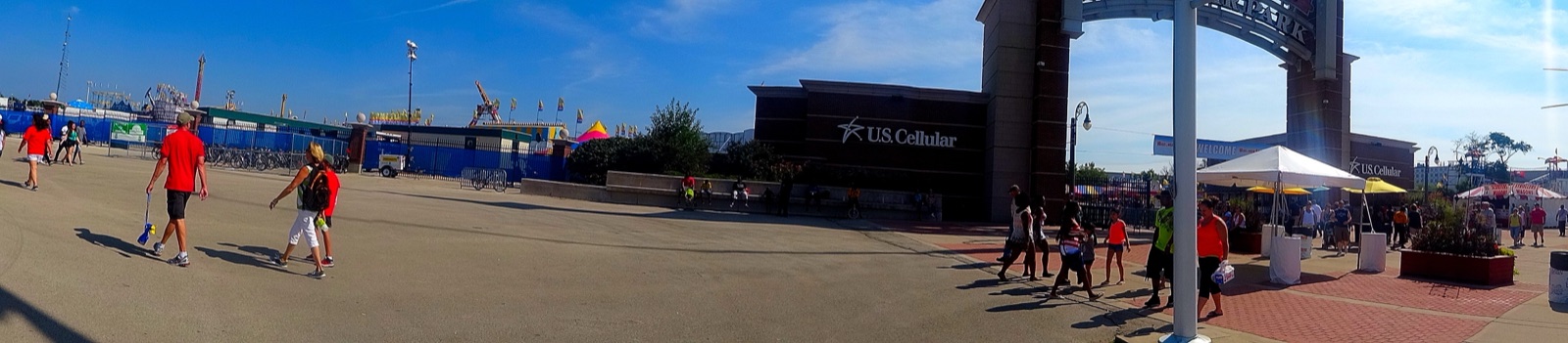 Wisconsin State Fair Main Entrance panorama showing carnival rides and the front gate at Wisconsin State Fair Park