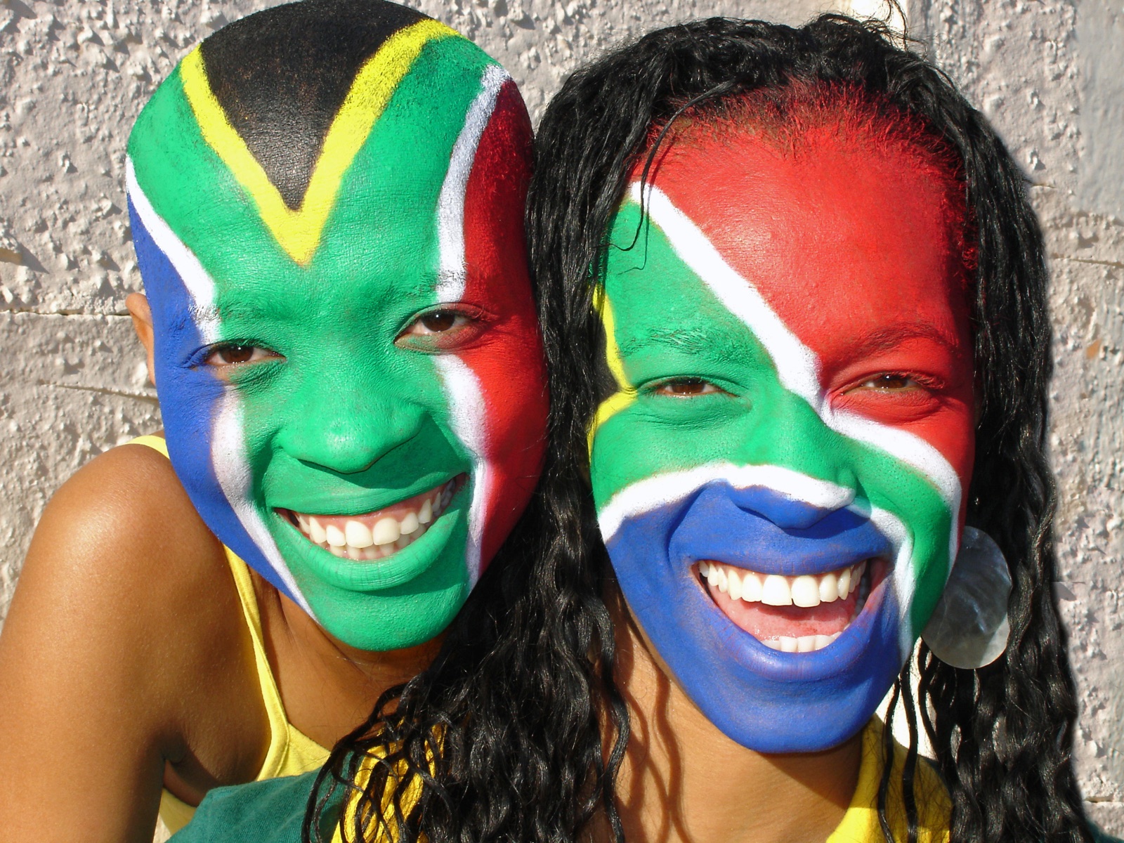 FIFA World Cup fans cheering in a packed stadium during a tournament match